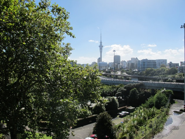 down the side roads off Karangahape Road, the Harbour Bridge and the Sky Tower.